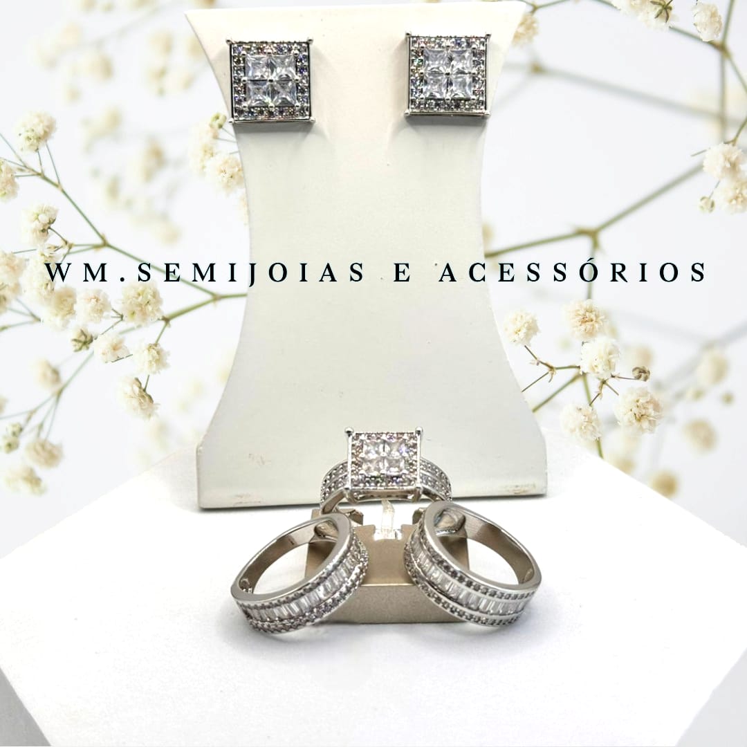 Conjunto com brincos e trio de anéis em banho ródio com cravação em Microzircônias.